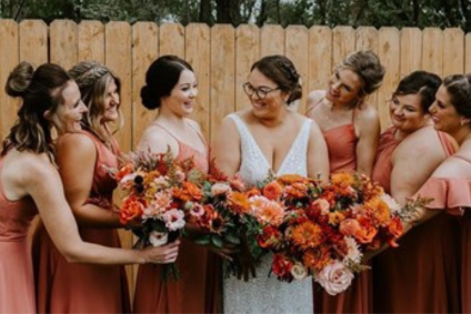 A bride and her bridesmaids with beautiful Fleurish Flower Farm bouquets.